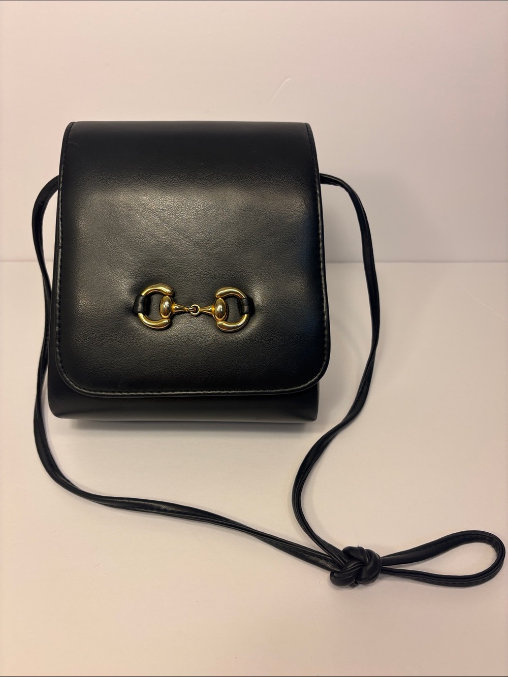 Vintage Deep Navy Leather Crossbody Bag with Gold Horsebit Accent US Pat 4453294